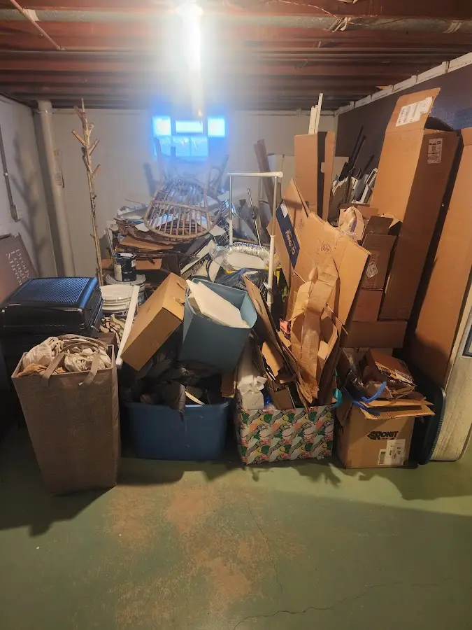 Roll-off dumpster container at job site for Construction Dumpster Rental in Three Lakes